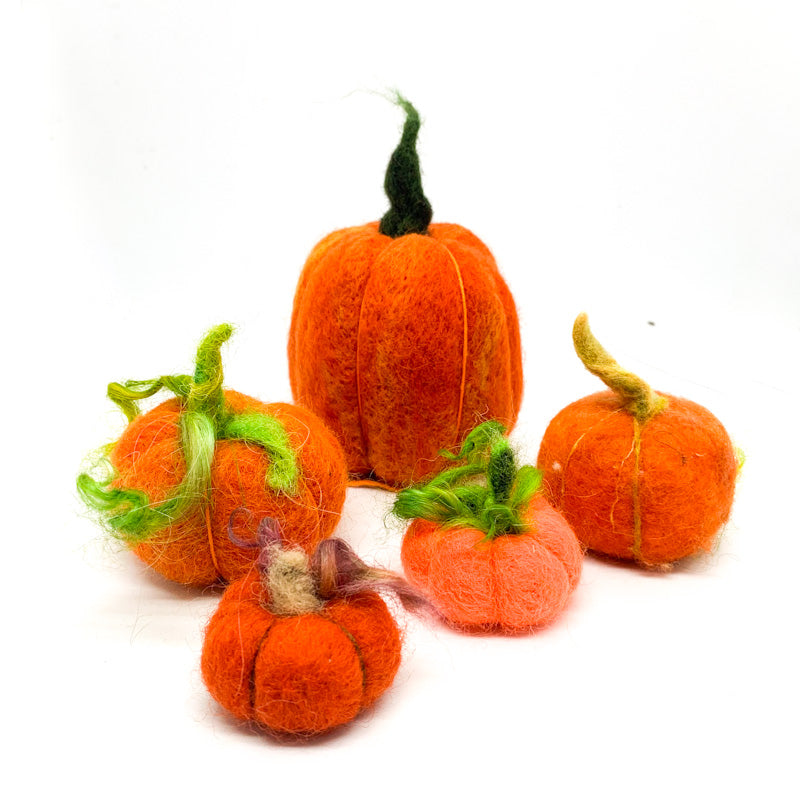 needle felted pumpking of various shapes and sized to celebrate autumn
